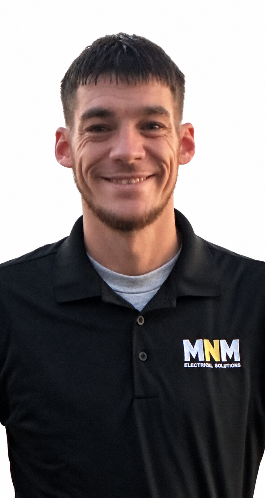 Miles Miller, owner of MNM Electrical Solutions, wearing his MNM work polo